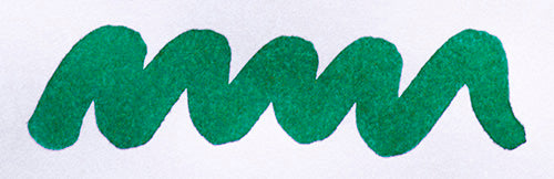Wavy green line on a white background. Diamine Cool Green fountain pen ink colour swatch.