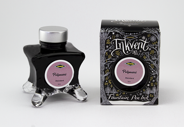 Diamine Potpourri fountain pen ink bottle and packaging on a white background.