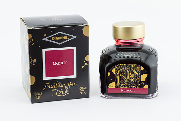 Diamine Maroon fountain pen ink bottle and packaging on a white background.