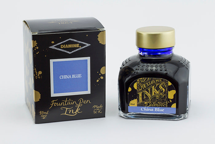 Diamine China Blue fountain pen ink bottle and packaging on a white background.