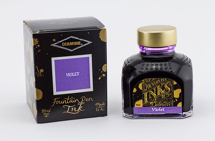 Diamine Violet fountain pen ink bottle and packaging on a white background.