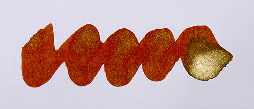Wavy orange brown line on a white background. Diamine Vintage Copper fountain pen ink colour swatch.