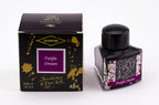 Diamine Purple Dream fountain pen ink bottle and packaging on a white background.