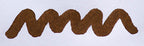 Wavy brown line on a white background. Diamine Saddle Brown fountain pen ink colour swatch.