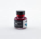 Diamine Raspberry Drawing and Calligraphy ink bottle on a white background.