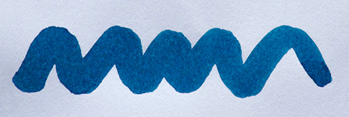 Wavy blue line on a white background. Diamine Kensington Blue fountain pen ink colour swatch.