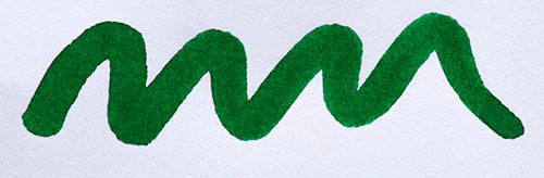 Wavy green line on a white background. Diamine Delamere Green fountain pen ink colour swatch.