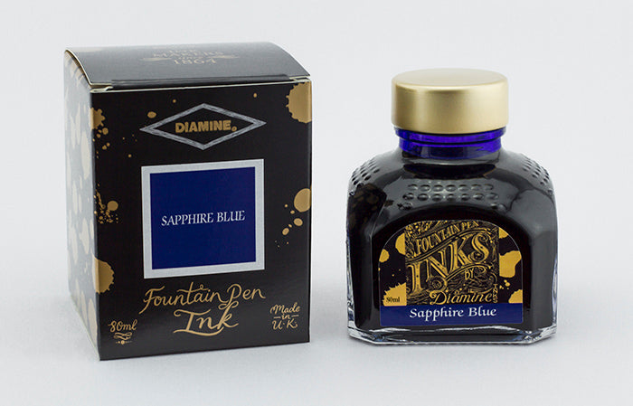 Diamine Sapphire Blue fountain pen ink bottle and packaging on a white background.