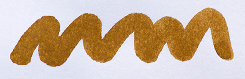 Wavy brown line on a white background. Diamine Golden Brown fountain pen ink colour swatch.