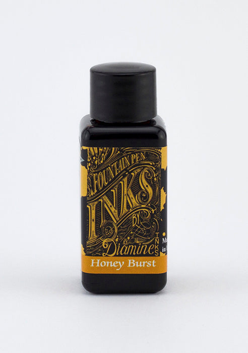 Diamine Honey Burst fountain pen ink bottle and packaging on a white background.