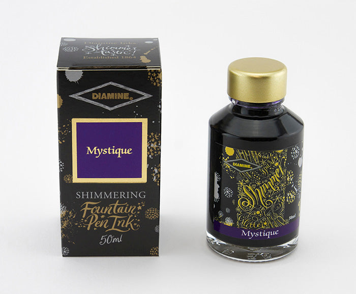 Diamine Mystique fountain pen ink bottle and packaging on a white background.
