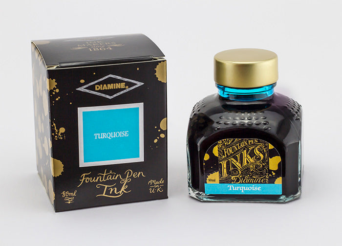 Diamine Turquoise fountain pen ink bottle and packaging on a white background.