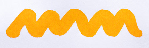 Wavy yellow line on a white background. Diamine Sunshine Yellow fountain pen ink colour swatch.