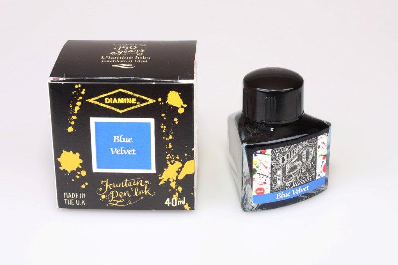 Diamine Blue Velvet fountain pen ink bottle and packaging on a white background.