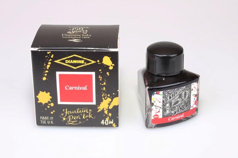 Diamine Carnival fountain pen ink bottle and packaging on a white background.
