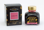 Diamine Flamingo Pink fountain pen ink bottle and packaging on a white background.