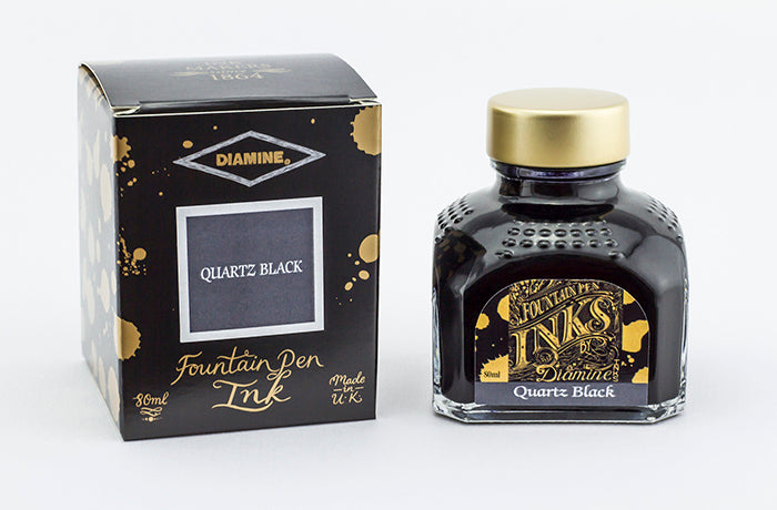 Diamine Quartz Black fountain pen ink bottle and packaging on a white background.