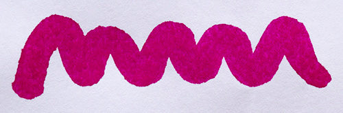 Wavy pink line on a white background. Diamine Deep Magenta fountain pen ink colour swatch.