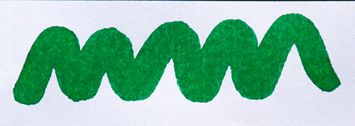 Wavy green line on a white background. Diamine Woodland Green fountain pen ink colour swatch.