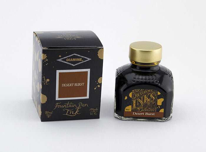 Diamine Desert Burst fountain pen ink bottle and packaging on a white background.
