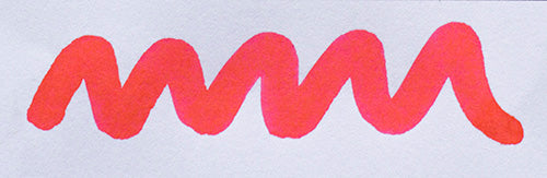 Wavy pink line on a white background. Diamine Pink fountain pen ink colour swatch.