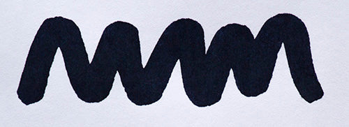 Wavy blue line on a white background. Diamine 1864 Blue Black fountain pen ink colour swatch.