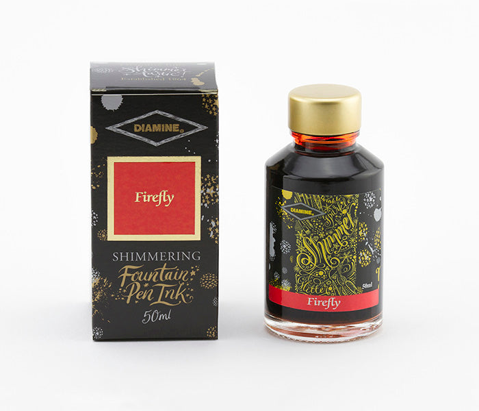 Diamine Firefly fountain pen ink bottle and packaging on a white background.