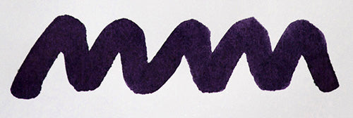 Wavy purple line on a white background. Diamine Lilac Night fountain pen ink colour swatch.