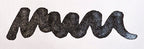 Wavy black line on a white background. Diamine Night Sky fountain pen ink colour swatch.
