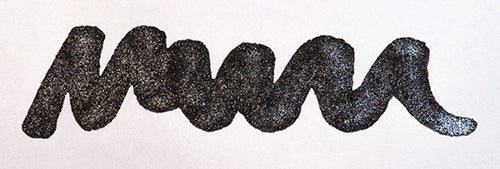 Wavy black line on a white background. Diamine Night Sky fountain pen ink colour swatch.
