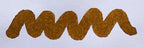 Wavy brown line on a white background. Diamine Raw Sienna fountain pen ink colour swatch.