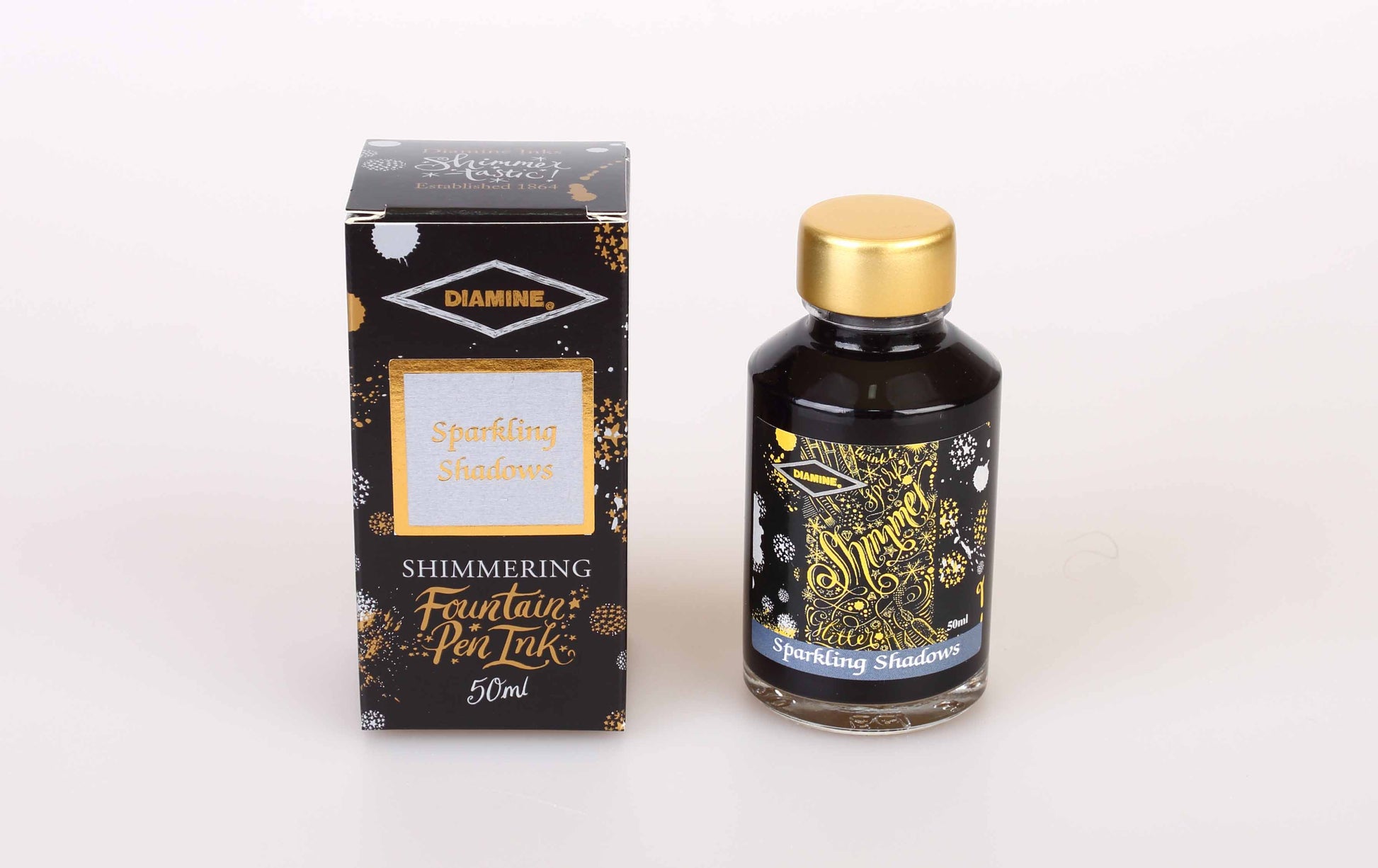 Diamine Sparkling Shadows fountain pen ink bottle and packaging on a white background.