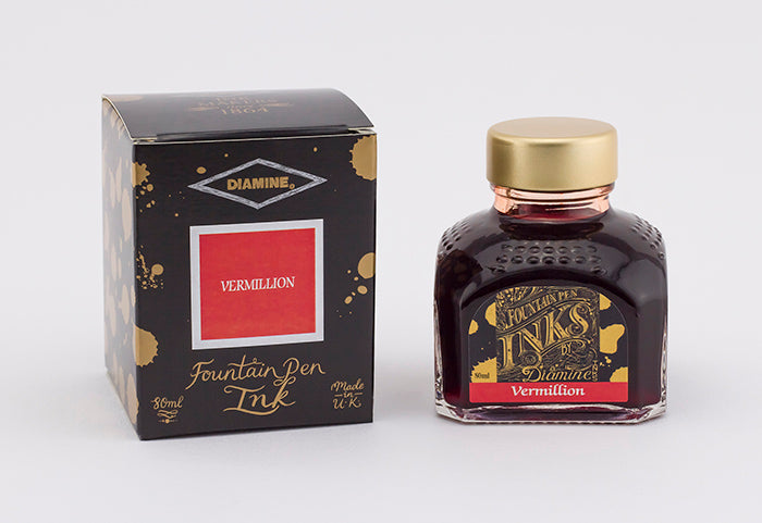 Diamine Vermillion fountain pen ink bottle and packaging on a white background.