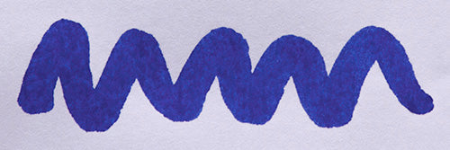 Wavy blue line on a white background. Diamine Presidential Blue fountain pen ink colour swatch.