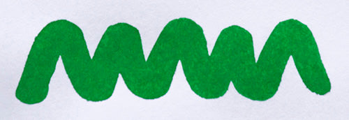 Wavy green line on a white background. Diamine Ultra Green fountain pen ink colour swatch.