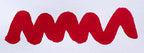 Wavy red line on a white background. Diamine Ruby fountain pen ink colour swatch.