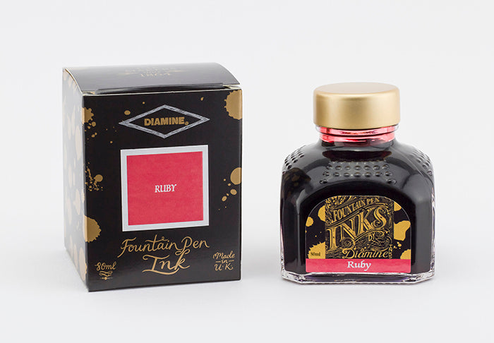 Diamine Ruby fountain pen ink bottle and packaging on a white background.