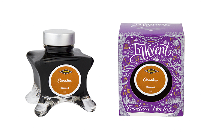 Diamine Cinnabun fountain pen ink bottle and packaging on a white background.