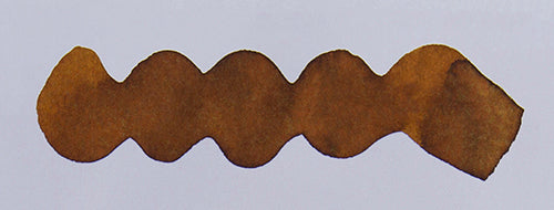 Wavy brown line on a white background. Diamine Desert Burst fountain pen ink colour swatch.