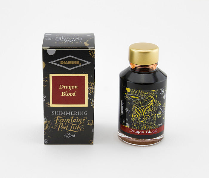 Diamine Dragon Blood fountain pen ink bottle and packaging on a white background.