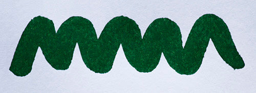 Wavy green line on a white background. Diamine Beethoven fountain pen ink colour swatch.