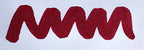 Wavy red line on a white background. Diamine Burgundy Rose fountain pen ink colour swatch.