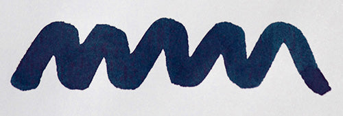Wavy blue line on a white background. Diamine Tudor Blue fountain pen ink colour swatch.