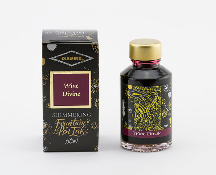 Diamine Wine Divine fountain pen ink bottle and packaging on a white background.
