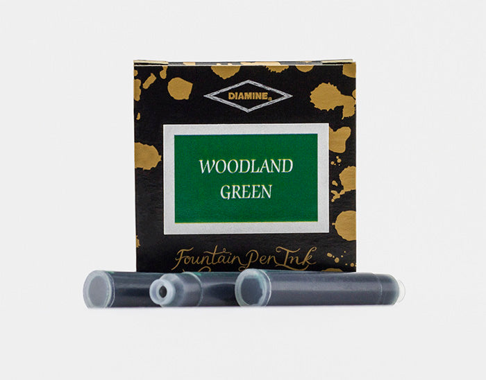 Diamine Woodland Green fountain pen ink cartridges and packaging box on a white background.
