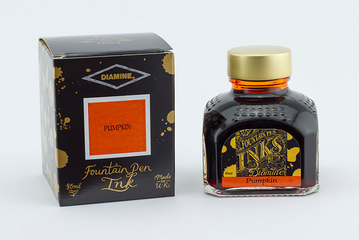 Diamine Pumpkin fountain pen ink bottle and packaging on a white background.