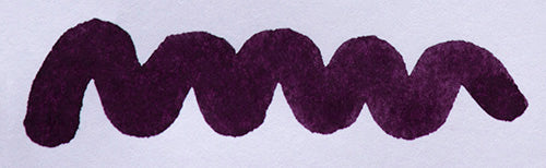 Wavy purple line on a white background. Diamine Damson fountain pen ink colour swatch.