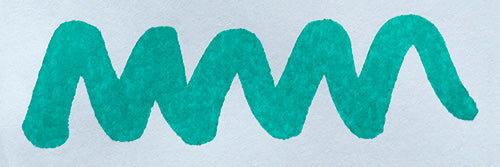 Wavy teal line on a white background. Diamine Marine fountain pen ink colour swatch.