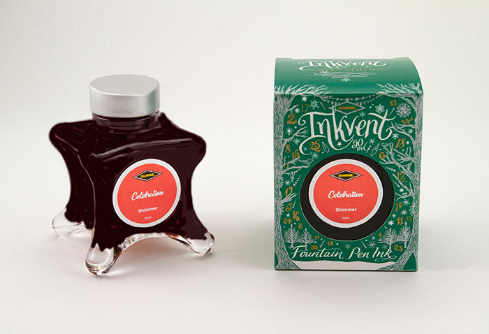Diamine Celebration fountain pen ink bottle and packaging on a white background.