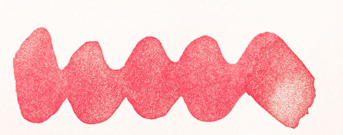 Wavy pink line on a white background. Diamine Pink Ice fountain pen ink colour swatch.